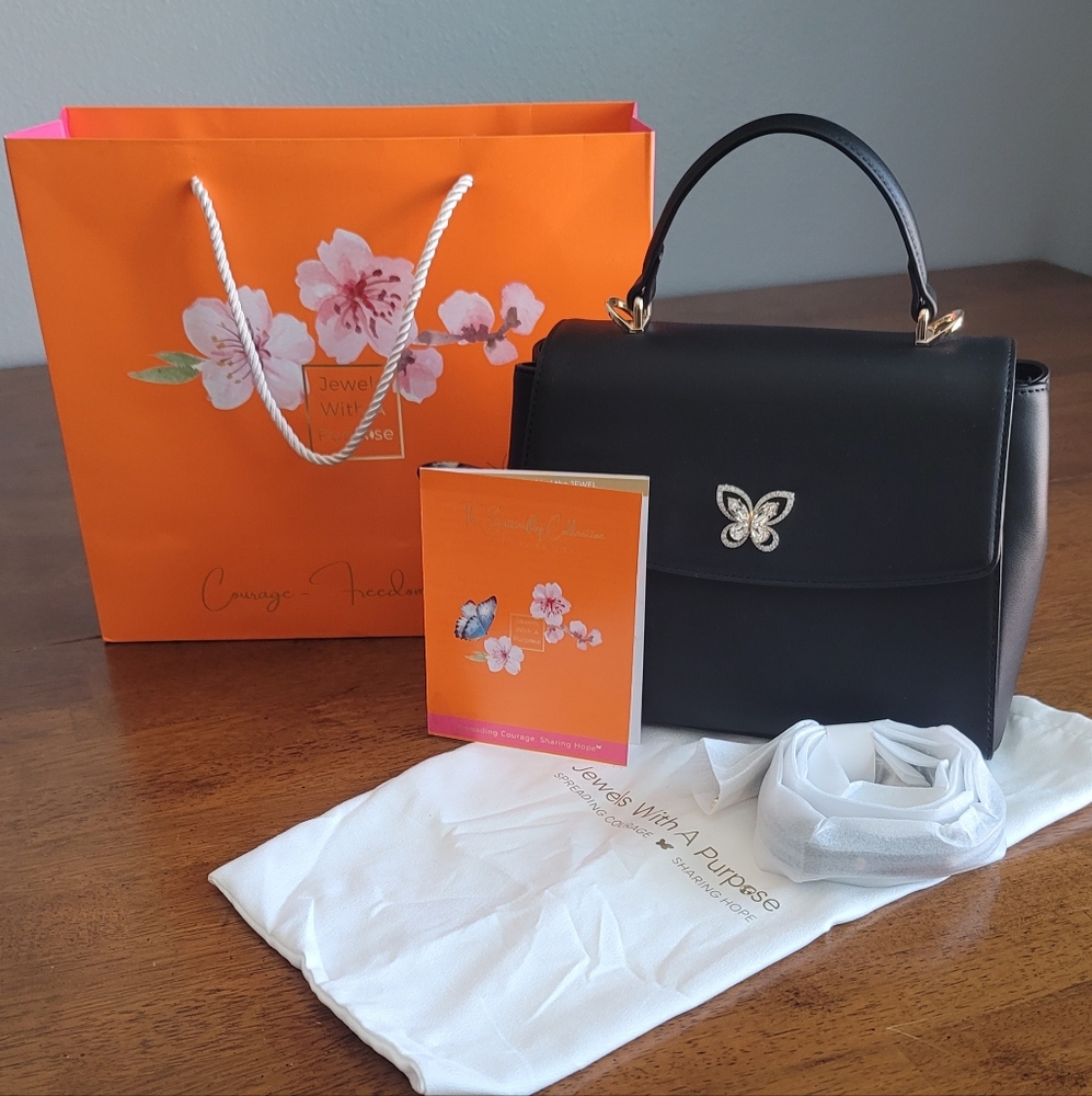Elegant Black Leather Handbag with Butterfly Accent NWOT